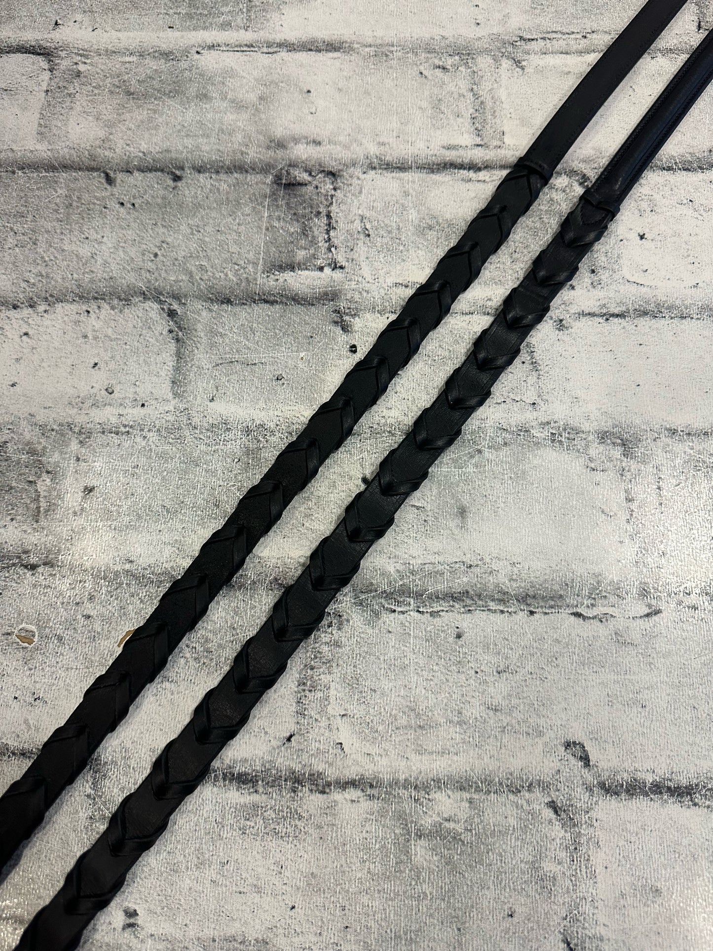 Raised Leather Laced Reins Black